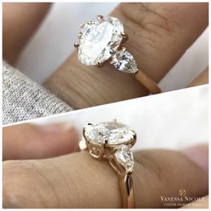 Oval Cut Diamond Three Stone Engagement Ring Rose Gold Color Metal