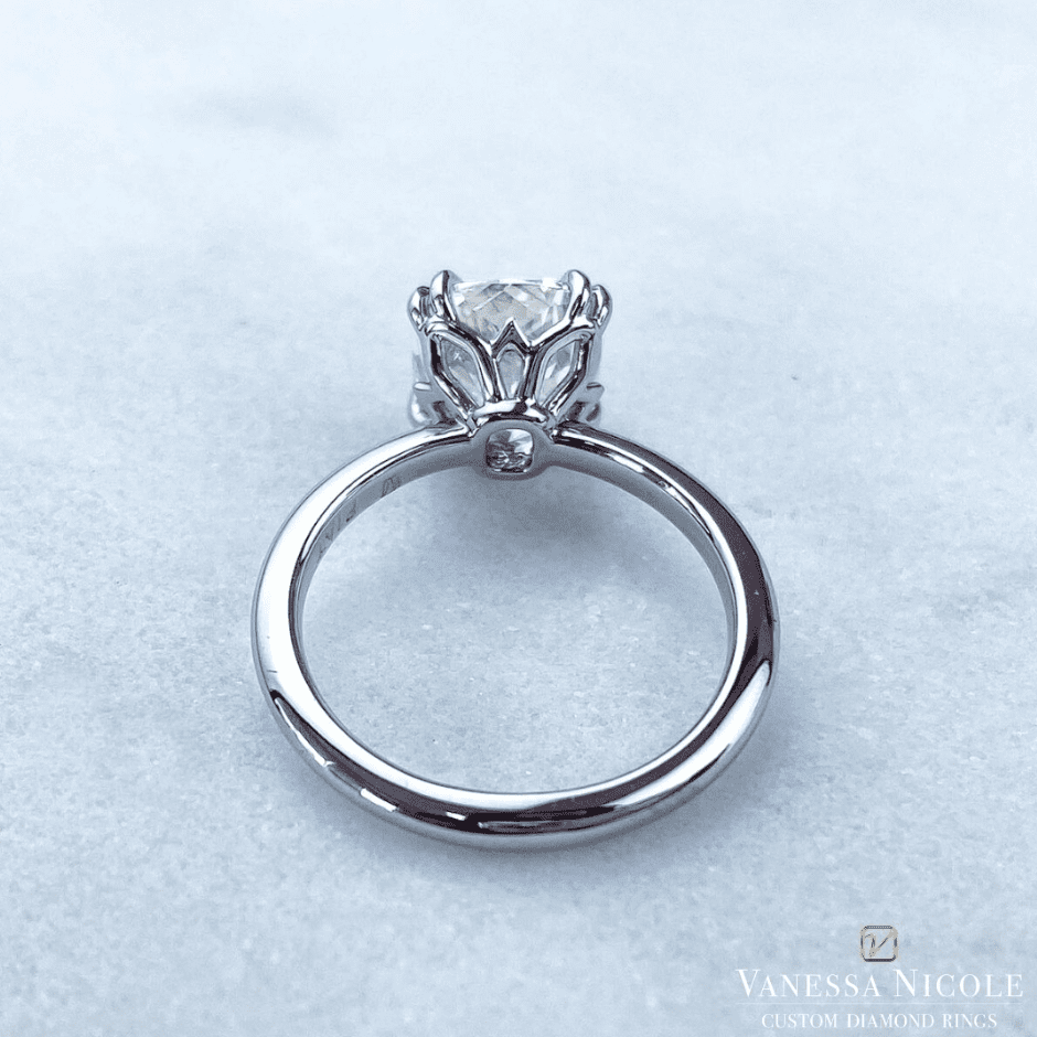 custom diamond solitaire ring in unique prong setting