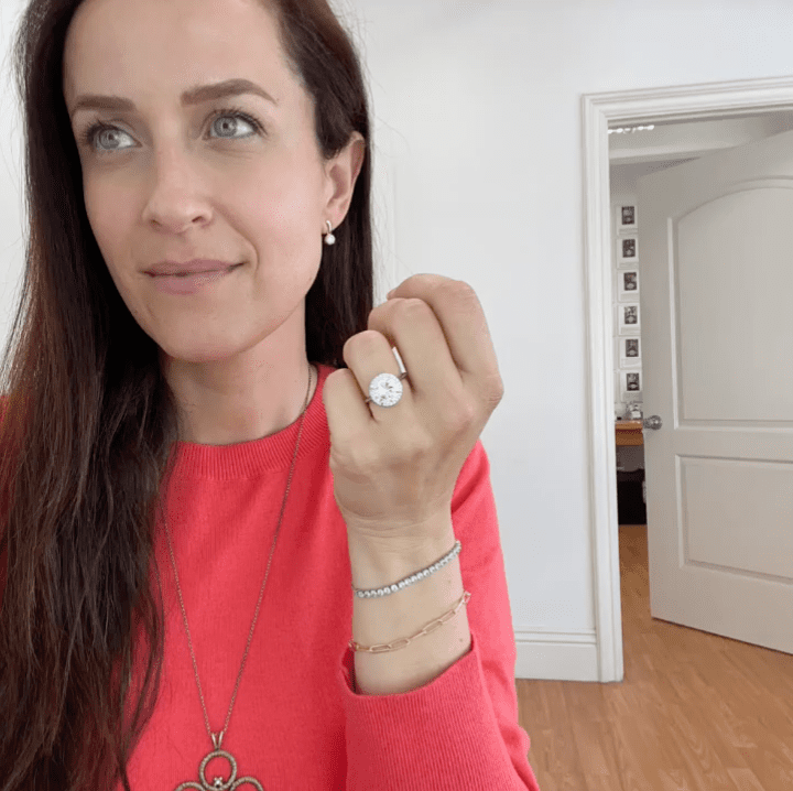 Vanessa round halo Vanessa Nicole wearing custom halo engagement ring